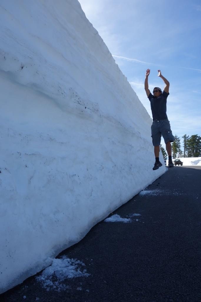 Jon using the snow bank to test his vertical jump